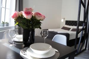 Posteľ alebo postele v izbe v ubytovaní Black & White Apartament