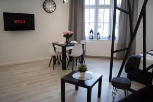 Photo de la galerie de l'établissement Black & White Apartament, à Toruń
