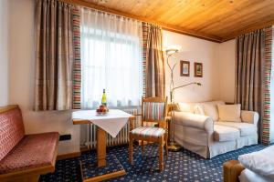 Posezení v ubytování Hotel Alpina