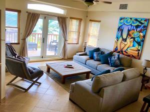 Posezení v ubytování Caye Reef Condos