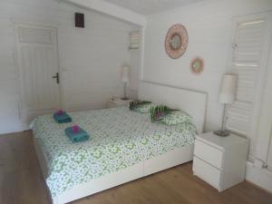 Tartane Grand Appartement Vue Mer 객실 침대