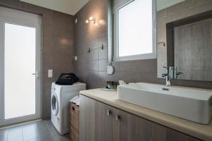 Kúpeľňa v ubytovaní Villa Roxanne