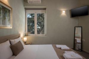 Posteľ alebo postele v izbe v ubytovaní Villa Roxanne