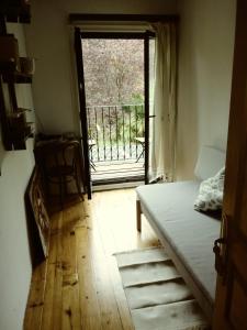 A bed or beds in a room at Jardín de Hoz