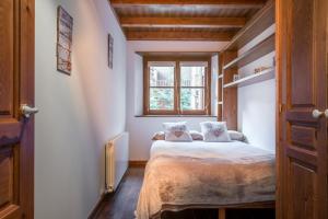 A bed or beds in a room at Apartamento Garona by Totiaran