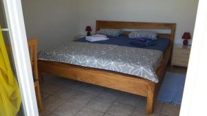 Postel nebo postele na pokoji v ubytování Apartments Vrgada
