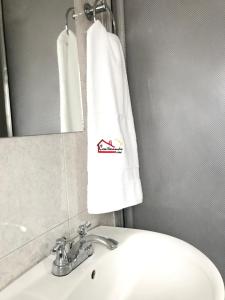 Koupelna v ubytování Hotel Casa Normandia