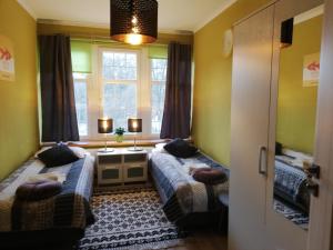 Posteľ alebo postele v izbe v ubytovaní Apartament Nectar Pond