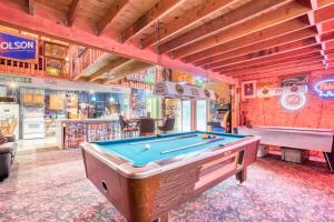 a billiard room with a pool table in it at Getaway Bar on Easy Street in Rockaway Beach