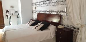 Postel nebo postele na pokoji v ubytování Hotel Iris La Eliana