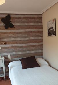 Postel nebo postele na pokoji v ubytování Hotel Iris La Eliana