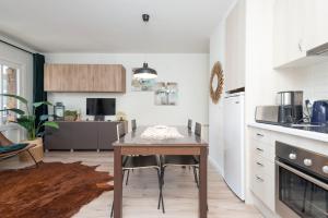 Kuchyň nebo kuchyňský kout v ubytování Apartamentos Mikka Mundial