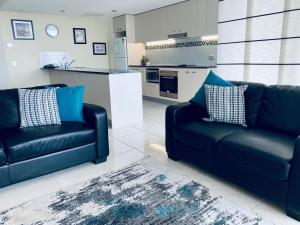 Ein Sitzbereich in der Unterkunft Ocean Views Resort Caloundra