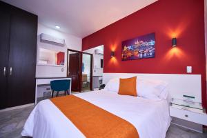 Postel nebo postele na pokoji v ubytování Casa Esmeralda Hotel Boutique