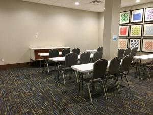 a classroom with tables and chairs in a room at Holiday Inn Express - Grand Island by IHG in Niagara Falls