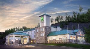 a clock tower in front of a building at Holiday Inn Express Houghton-Keweenaw, an IHG Hotel in Houghton