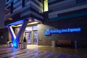 a building with a sign that reads holiday inn express at Holiday Inn Express Manchester City Centre Arena by IHG in Manchester