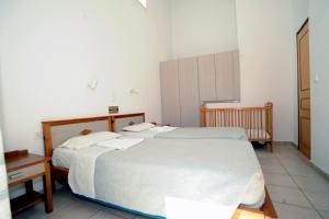 Postel nebo postele na pokoji v ubytování Evilion hotel