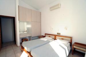 Postel nebo postele na pokoji v ubytování Evilion hotel