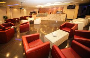 The lounge or bar area at Etab Hotels & Suites