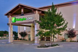 a building with a sign on the front of it at Holiday Inn Express of Salado-Belton, an IHG Hotel in Salado