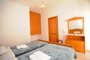 Postel nebo postele na pokoji v ubytování Evilion hotel