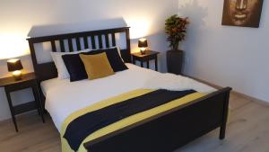 A bed or beds in a room at Le Monde Apartment Bratislava - amazing 5BDR in downtown