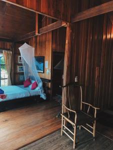 Postel nebo postele na pokoji v ubytování Thiwson Beach Resort - SHA Extra Plus