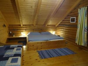 Postel nebo postele na pokoji v ubytování Ferienhütte Hochalm