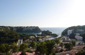 an aerial view of a city and the ocean at Menorca Bonavista in Cala Galdana
