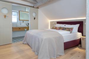Кровать или кровати в номере hezelhof´s Hexenhäuschen