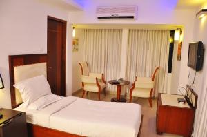 TV a/nebo společenská místnost v ubytování Hotel Luciya