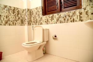 Ванна кімната в Senasuma Homestay