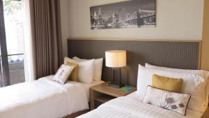 Postel nebo postele na pokoji v ubytování 5* 3BR SUITE in Amari Phuket - Patong Beach + 37 fotografií