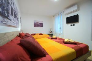 Postel nebo postele na pokoji v ubytování Aretè Apartments