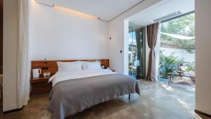 Φωτογραφία από το άλμπουμ του Ting Jian Empty Yard Pastoral Design Residential Dali Shop σε Νταλί