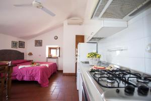A kitchen or kitchenette at Topazio