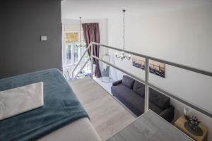 Posteľ alebo postele v izbe v ubytovaní Gallery Duplex Studio