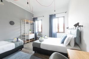 Katil atau katil-katil dalam bilik di Hotel Miceli - Civico 50