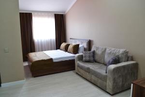 Postel nebo postele na pokoji v ubytování Supreme Hotel Baku