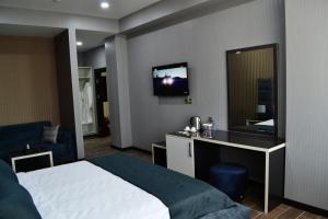 TV a/nebo společenská místnost v ubytování Supreme Hotel Baku