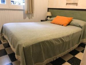 Una cama o camas en una habitación de Hotel Messina