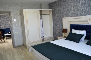 Postel nebo postele na pokoji v ubytování Supreme Hotel Baku