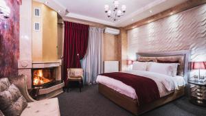 Postel nebo postele na pokoji v ubytování Eliton Hotel & Spa