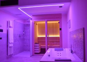Voodi või voodid majutusasutuse Hotel Saccardi & Spa - Adults Only toas
