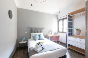 Postel nebo postele na pokoji v ubytování Hotel Miceli - Civico 50