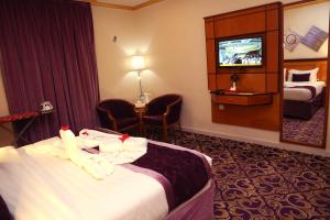 TV o dispositivi per l'intrattenimento presso Amjad Al Deafah Hotel