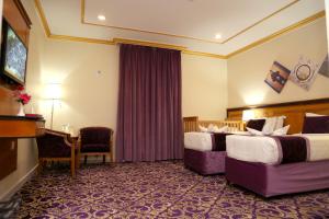 TV o dispositivi per l'intrattenimento presso Amjad Al Deafah Hotel