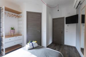 Postel nebo postele na pokoji v ubytování Hotel Miceli - Civico 50