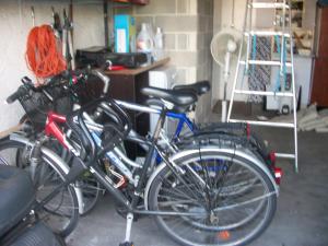 a group of bikes parked in a garage at Almigeda in Les Mathes